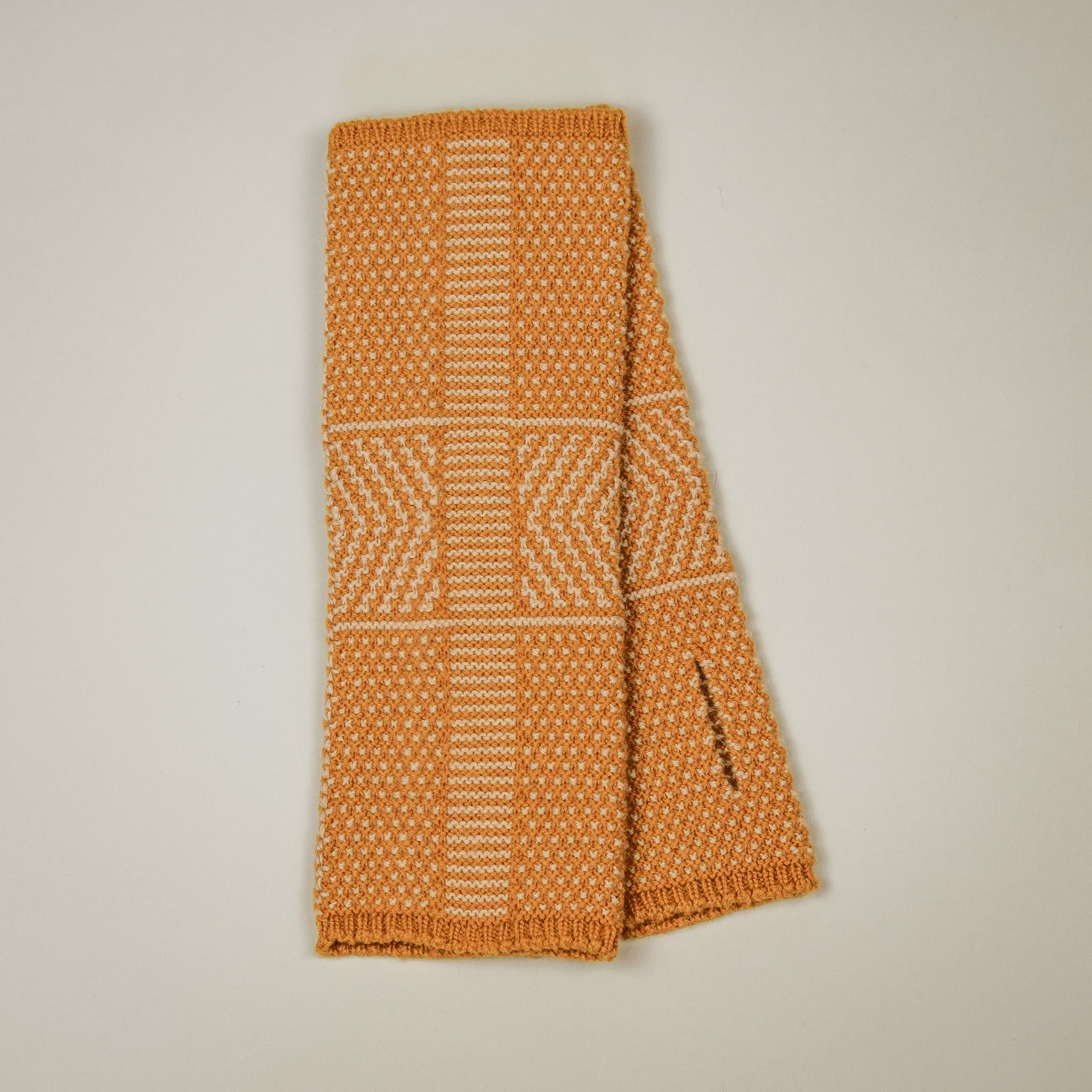 Taranaki Wrist Warmers in Camel Down