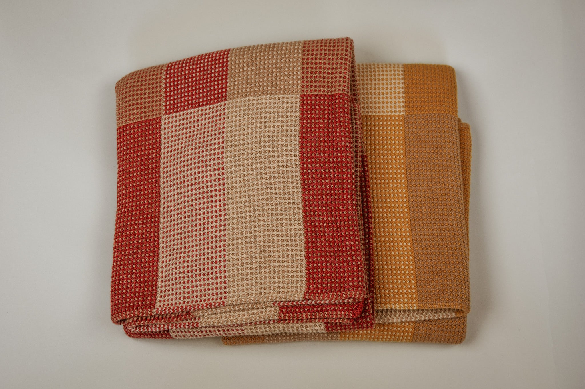 Waitaha Lap Blanket in Camel Down