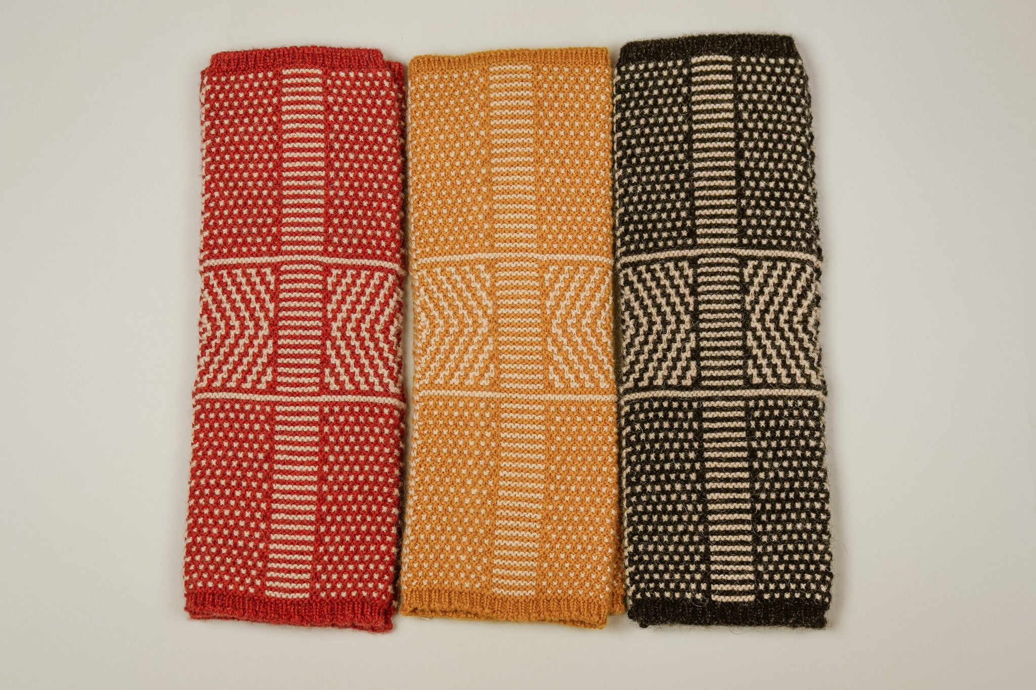 Taranaki Wrist Warmers in Camel Down